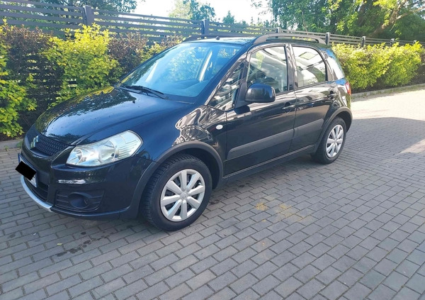 Suzuki SX4 cena 31900 przebieg: 135000, rok produkcji 2012 z Toruń małe 29